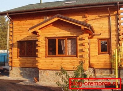 В снимката дървена къща от бар 200х200 В снимката дървена къща от бар 200х200