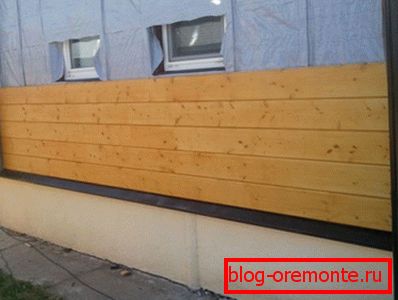 Затопляне на дървена къща от бар - процес на обшивка Затопляне на дървена къща от бар - процес на обшивка
